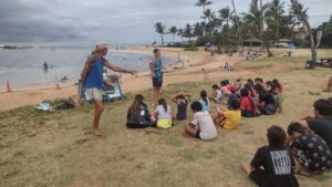 Group of people teaching at a beach